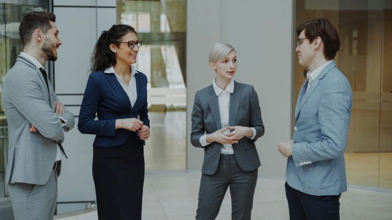 Senior leaders in professional conversation — executive coaching